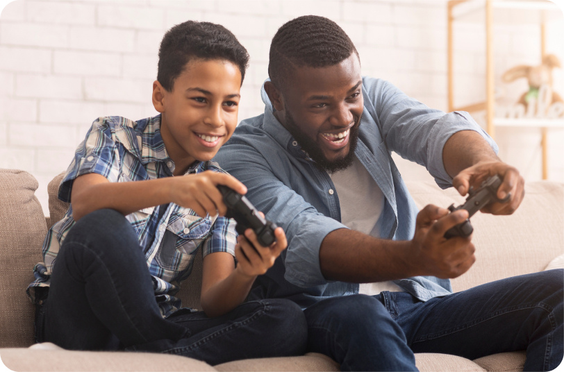 friends sitting on the couch playing video games