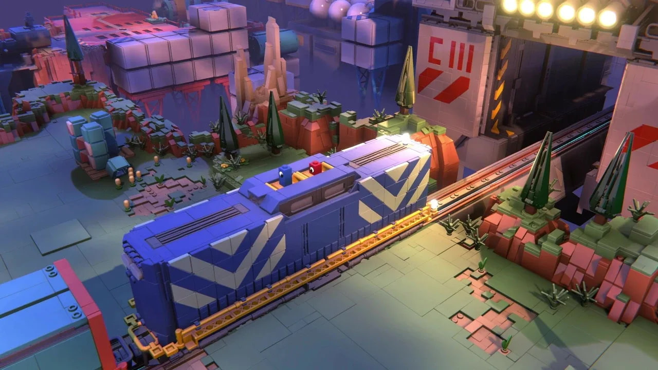 The Red and Blue LEGO bricks are sit on a blue train together in a forested, fully LEGO-made environment. 